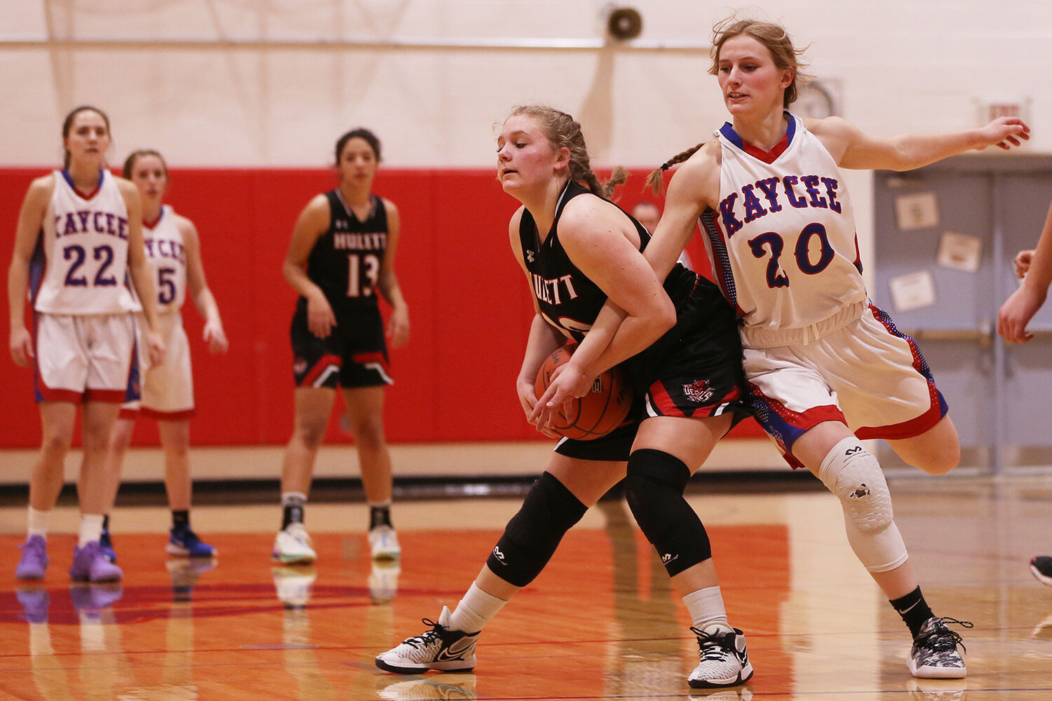 Tinley Pierson catches her arm inside Hulett freshman Myah Cornett’s arm